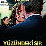 YÜZÜNDEKİ SIR